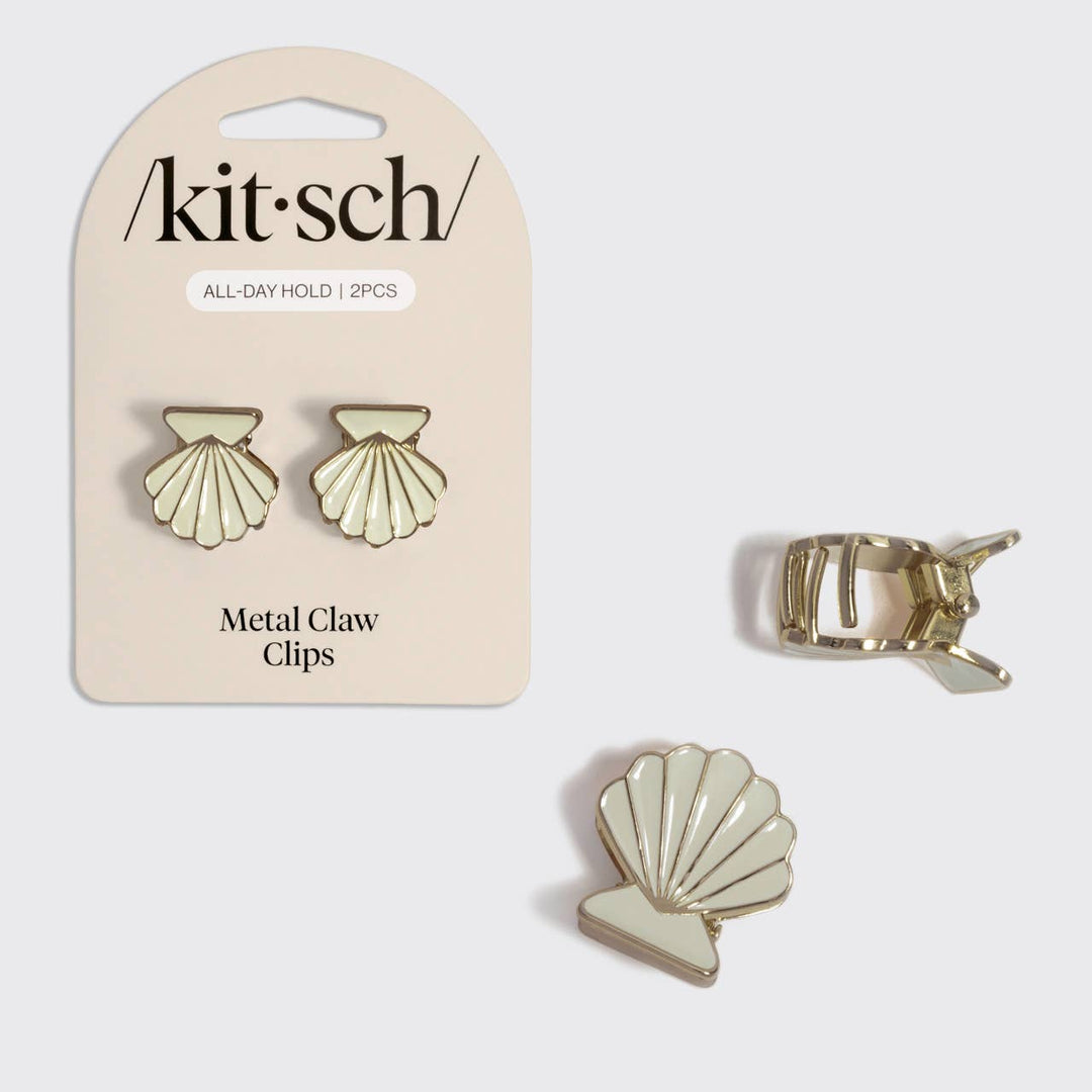 Kitsch Metal Claw Clips 2-piece set in cream enamel scallop shell design with gold trim, shown next to their retail packaging card labeled "All-Day Hold | 2PCS