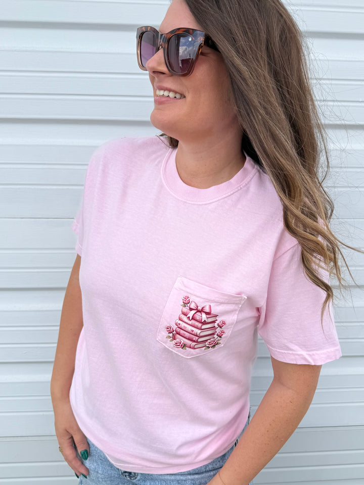 by PrepO: Valentine's Book Stack Pocket Graphic Tee (Ships in 2-3 Weeks)