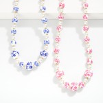 Beaded Necklace Featuring Porcelain Chinoiserie Flower Beads, Pearls, And Gold Tone Beads