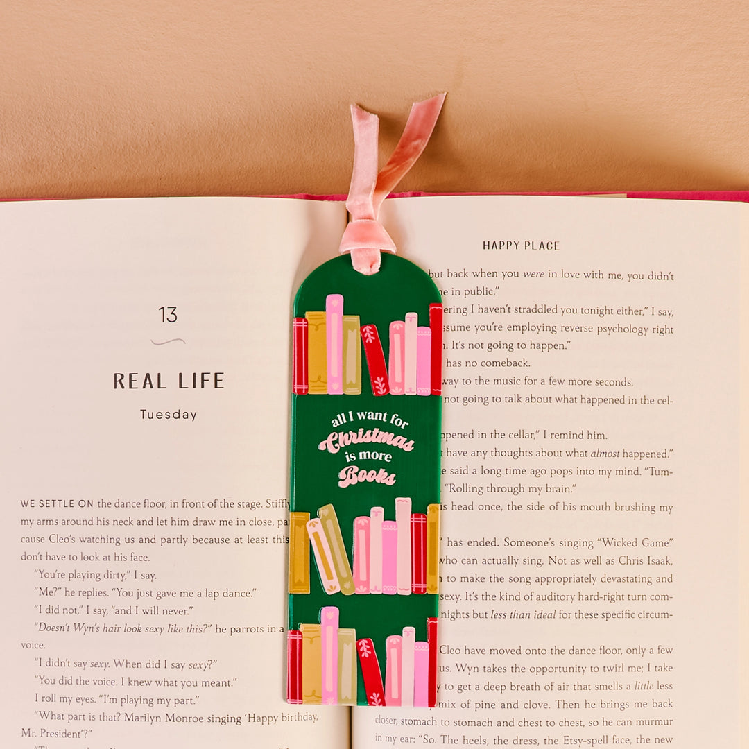'All I Want For Christmas Is More Books' Acrylic Bookmark by the Darling Effect