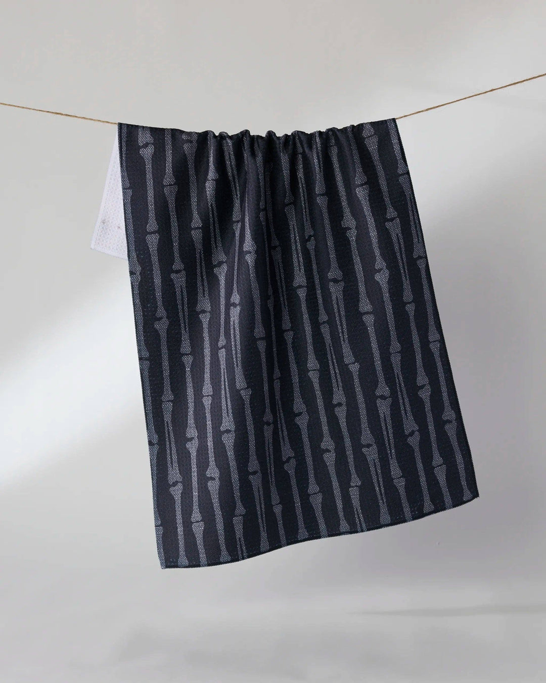 Rattler Black Tea Towel by Geometry