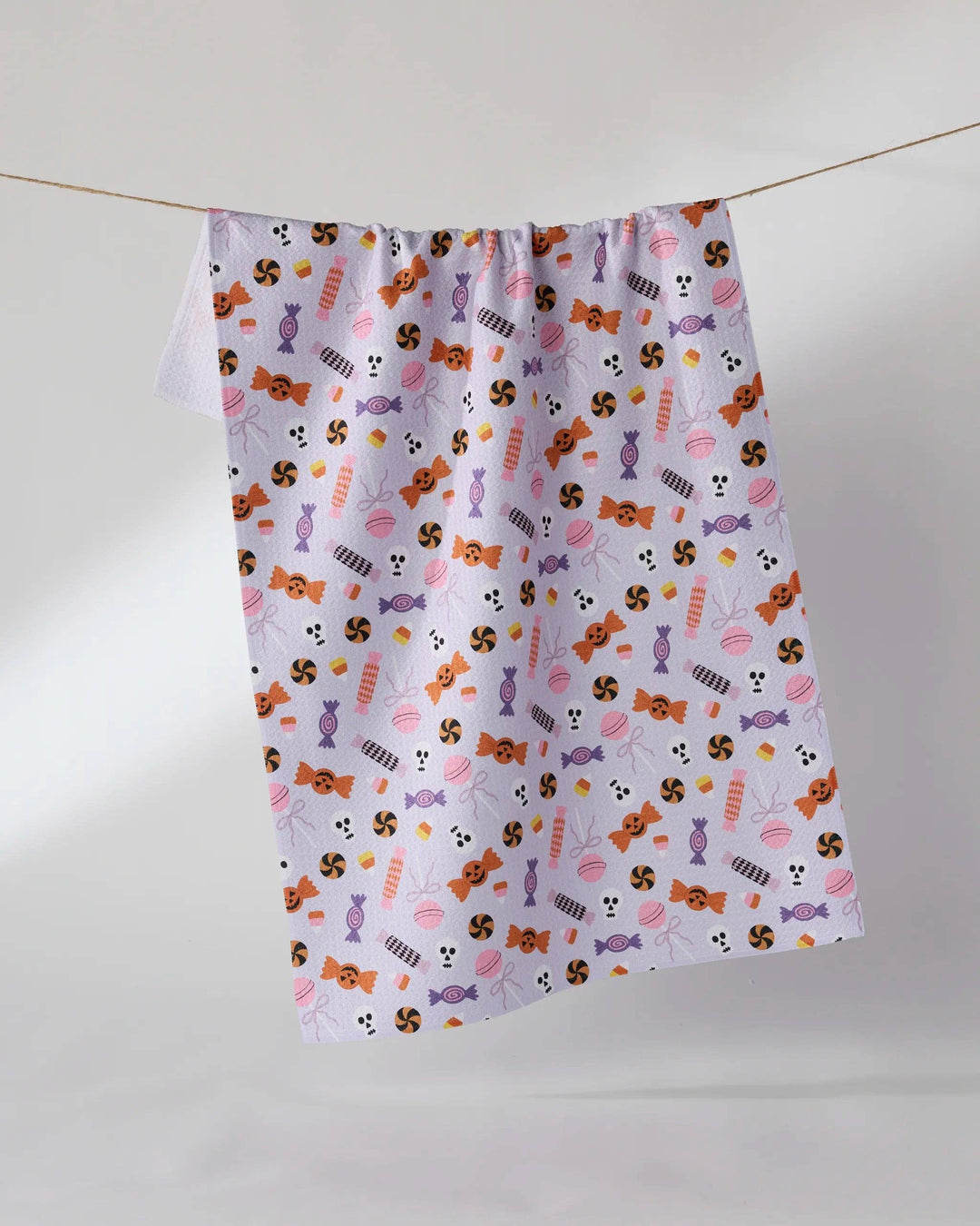 Spooky Sweets Purple Tea Towel by Geometry