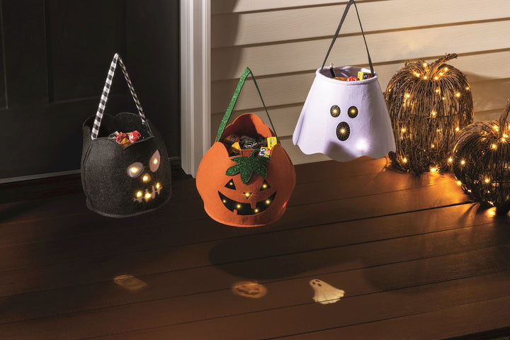 Light-Up Projection Treat Buckets by Mud Pie