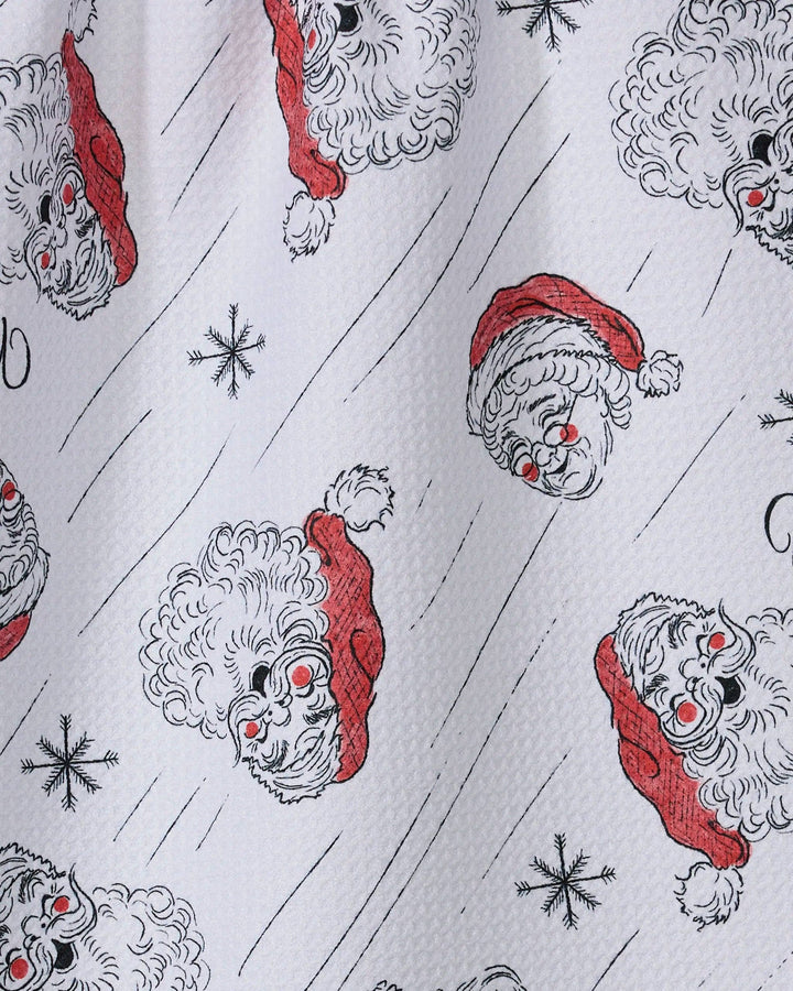 Claus Family Christmas Tea Towel by Geometry