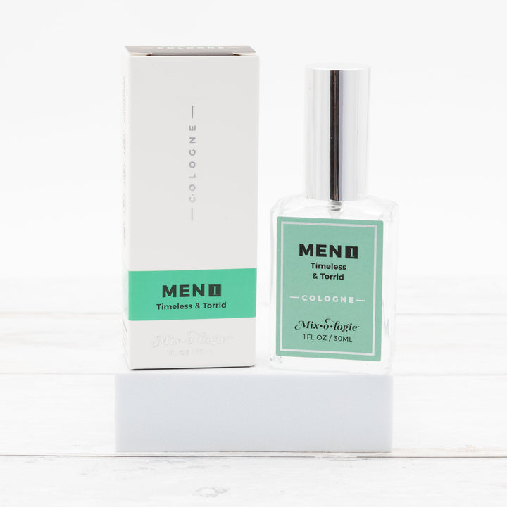 Mixologie Men I Timeless & Torrid Cologne, 1 fl oz, clear square glass spray bottle with silver cap and mint green label with matching white and green box