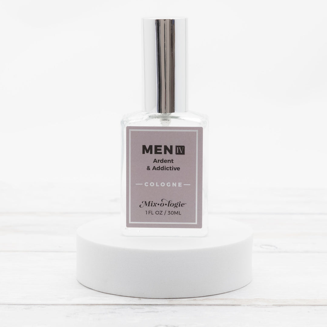 Mixologie Men IV Ardent & Addictive Cologne, 1 fl oz, clear square glass spray bottle with silver cap and mauve label, no box
