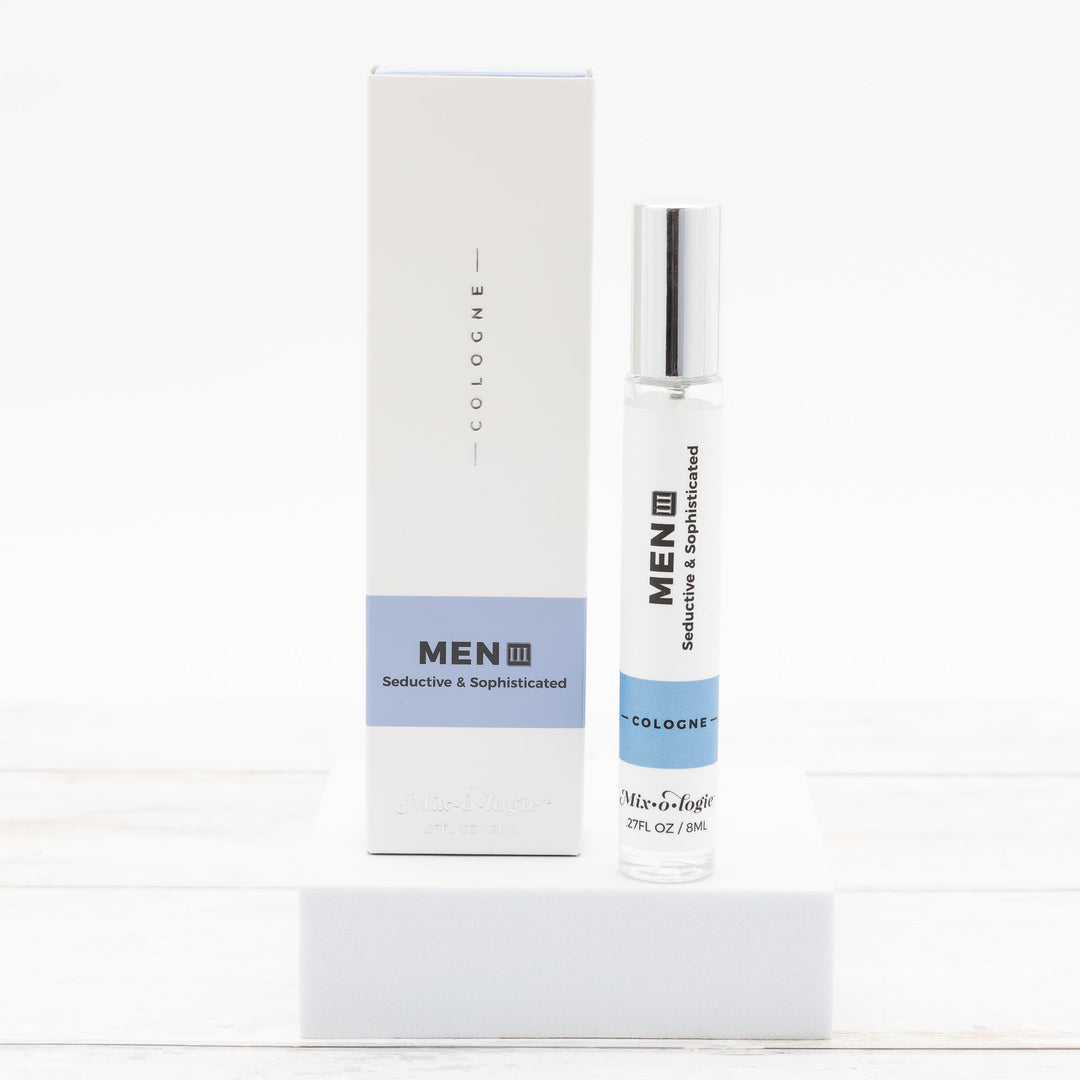 Mixologie Men III Seductive & Sophisticated Cologne, 0.27 fl oz, clear glass roller bottle with silver cap and light blue label with matching white and blue box