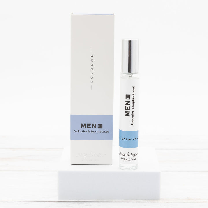 Mixologie Men III Seductive & Sophisticated Cologne, 0.27 fl oz, clear glass roller bottle with silver cap and light blue label with matching white and blue box