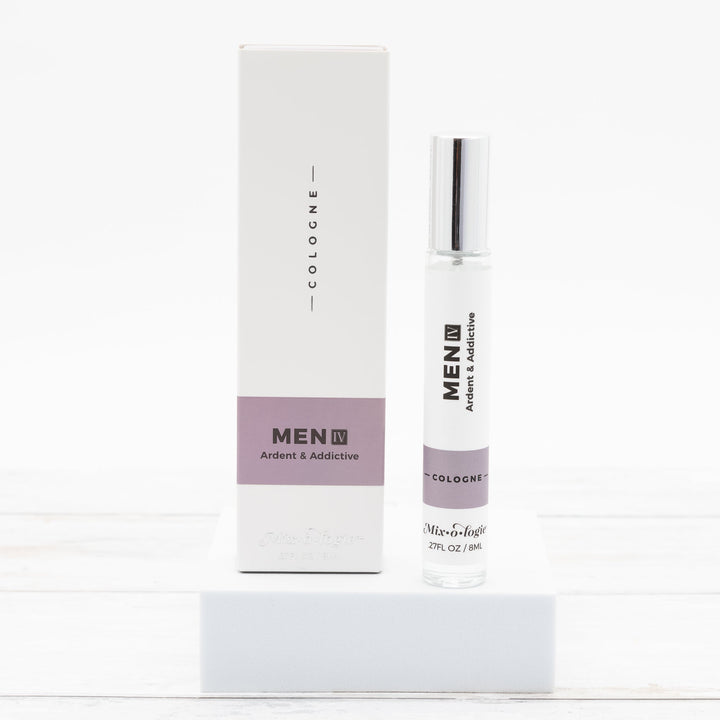 Mixologie Men IV Ardent & Addictive Cologne, 0.27 fl oz, clear glass roller bottle with silver cap and mauve label with matching white and mauve box