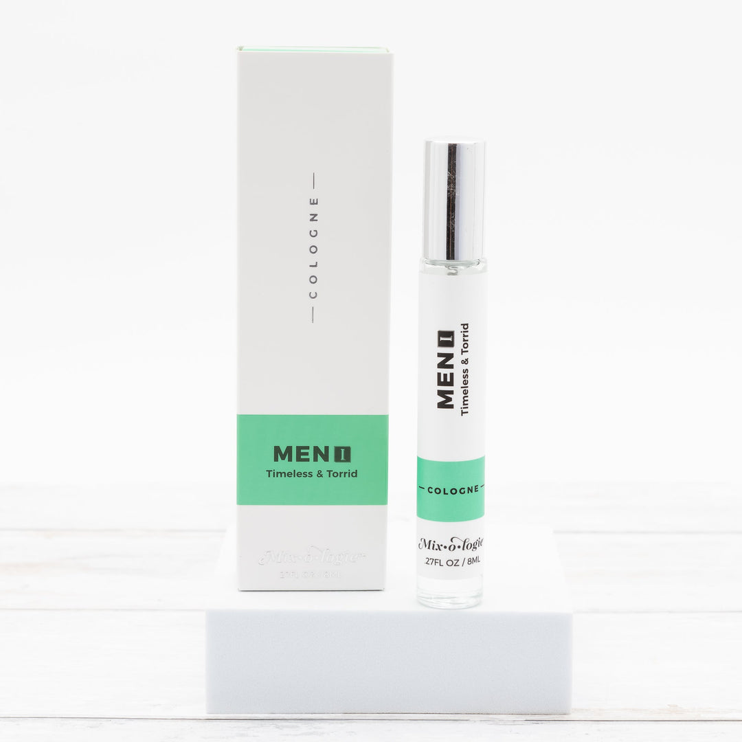 Mixologie Men I Timeless & Torrid Cologne, 0.27 fl oz, clear glass roller bottle with silver cap and mint green label with matching white and green box