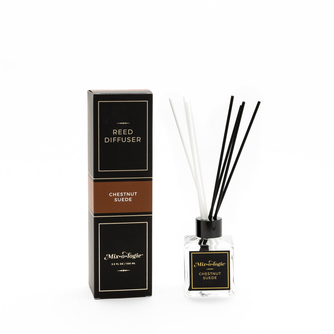 Mixologie Reed Diffuser in Chestnut Suede, 3.3 fl oz, clear square glass bottle with black cap and black label with brown accent band, with matching black and brown box