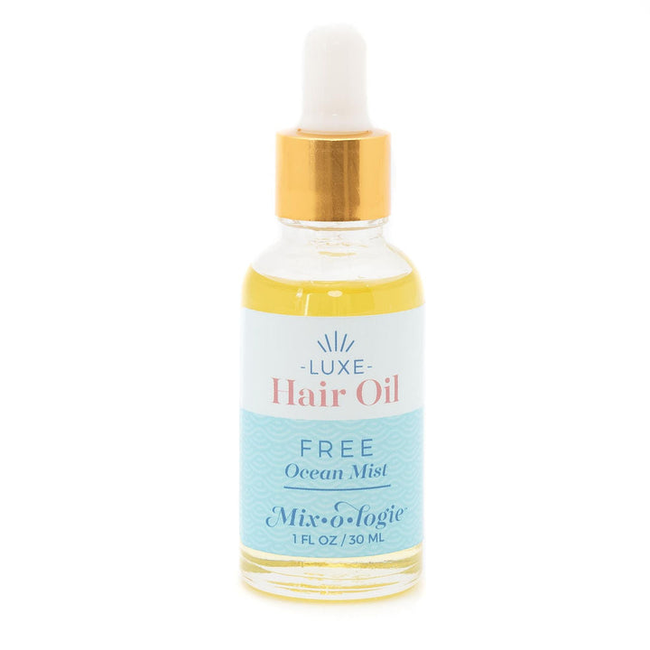 Mixologie Luxe Hair Oil in Free Ocean Mist, 1 fl oz, clear dropper bottle with gold cap and light blue label
