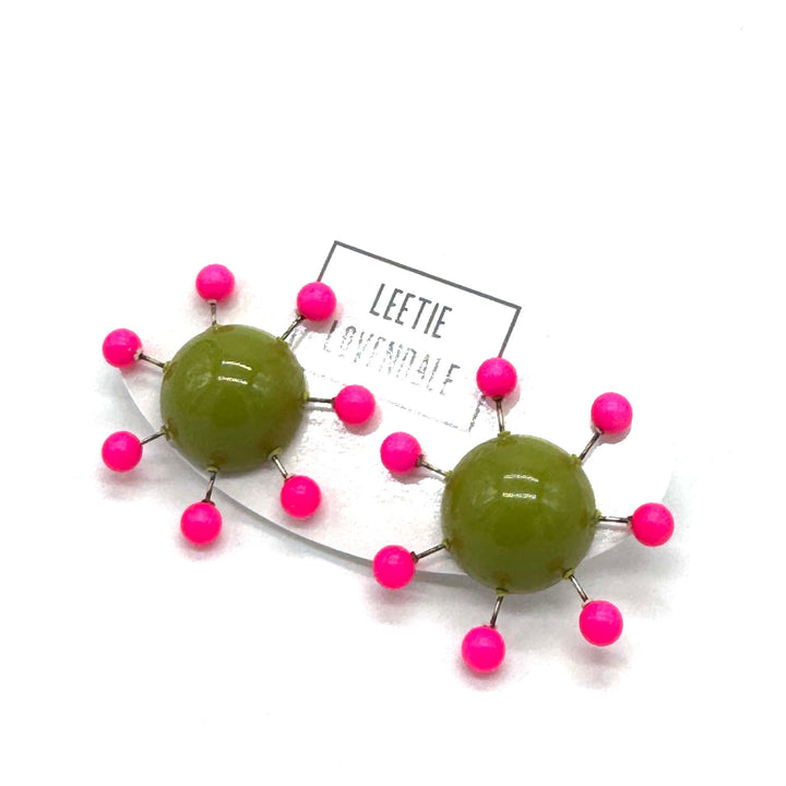 OlIve green earrings with hot pink beads radiating from center with posts