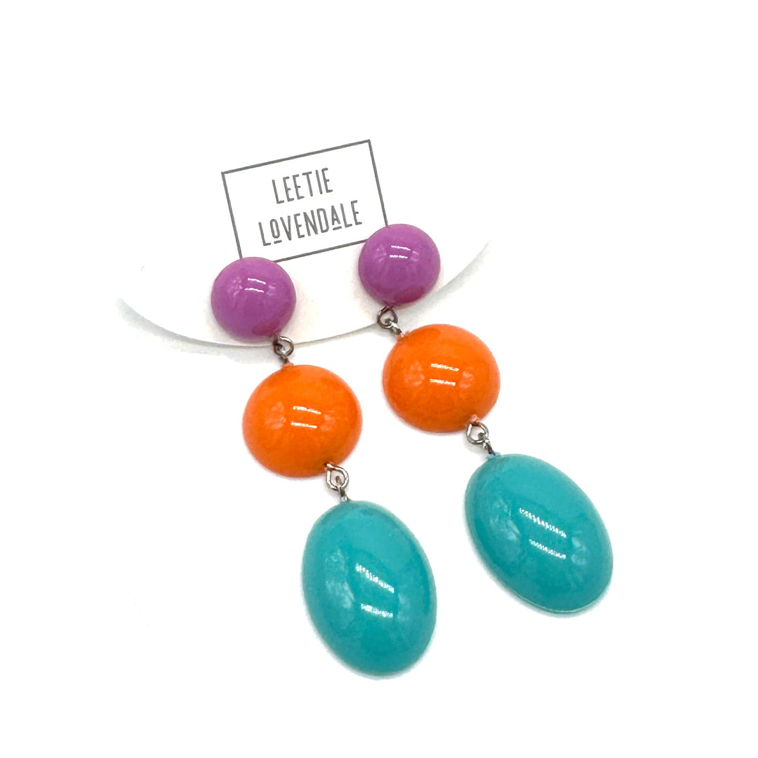 Colorful beaded earrings with 'Leetie Lovendale' branding on a white background