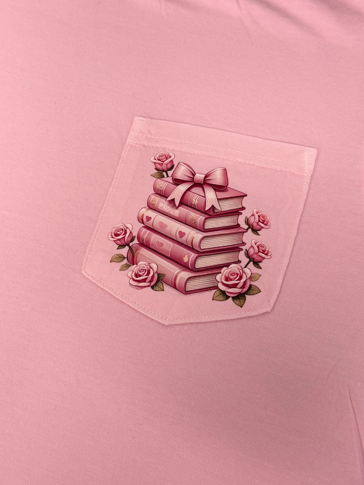 by PrepO: Valentine's Book Stack Pocket Graphic Tee (Ships in 2-3 Weeks)