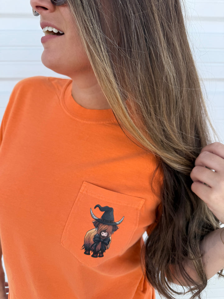 by PrepO: Halloween Highland Cow Comfort Colors Pocket Tee (Ships in 1-2 Weeks)