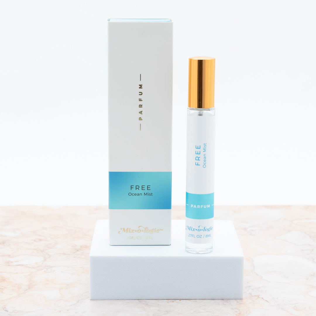 Mixologie Parfum in Free Ocean Mist, 0.27 fl oz, clear glass roller bottle with gold cap and light blue box
