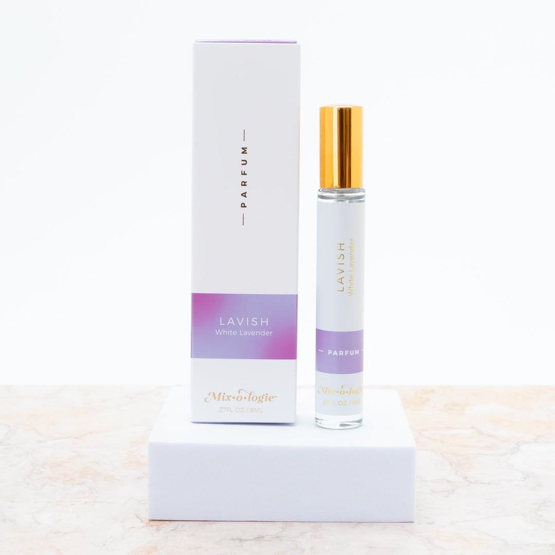 Mixologie Parfum in Lavish White Lavender, 0.27 fl oz, clear glass roller bottle with gold cap and lavender gradient box
