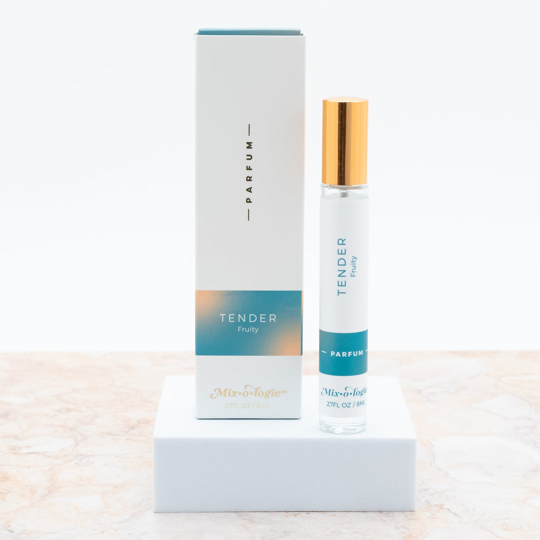 Mixologie Parfum in Tender Fruity, 0.27 fl oz, clear glass roller bottle with gold cap and teal and peach gradient box

