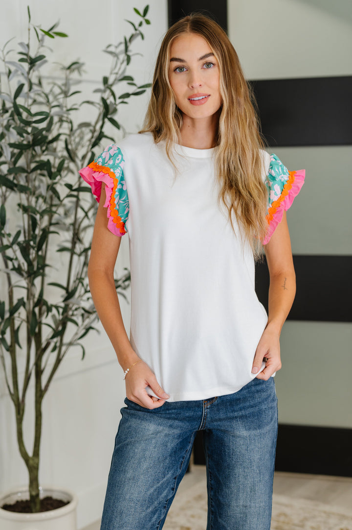 Petals & Poise Floral Flutter Sleeve Top in White - 6/25