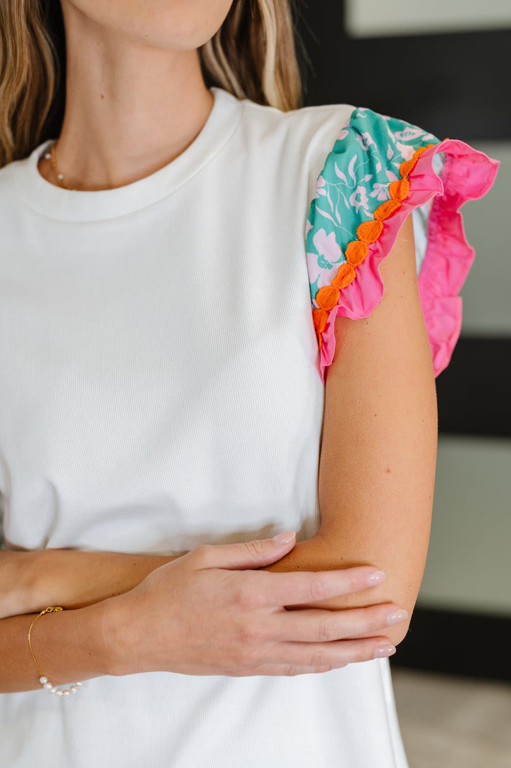 Petals & Poise Floral Flutter Sleeve Top in White - 6/25