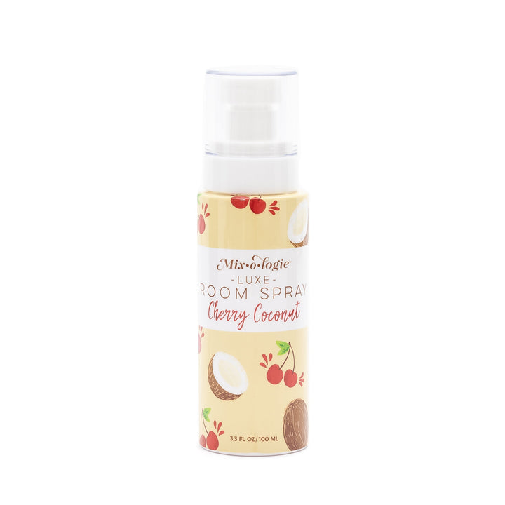 Mixologie Luxe Room Spray in Cherry Coconut, 3.3 fl oz, clear pump bottle with cream and red cherry and coconut illustrated label