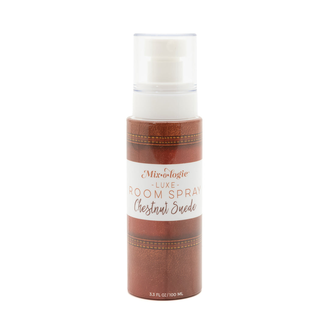 Mixologie Luxe Room Spray in Chestnut Suede, 3.3 fl oz, clear pump bottle with rich brown leather-textured label with stitching detail
