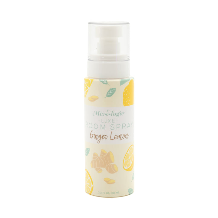 Mixologie Luxe Room Spray in Ginger Lemon, 3.3 fl oz, clear pump bottle with cream lemon slice and ginger root illustrated label