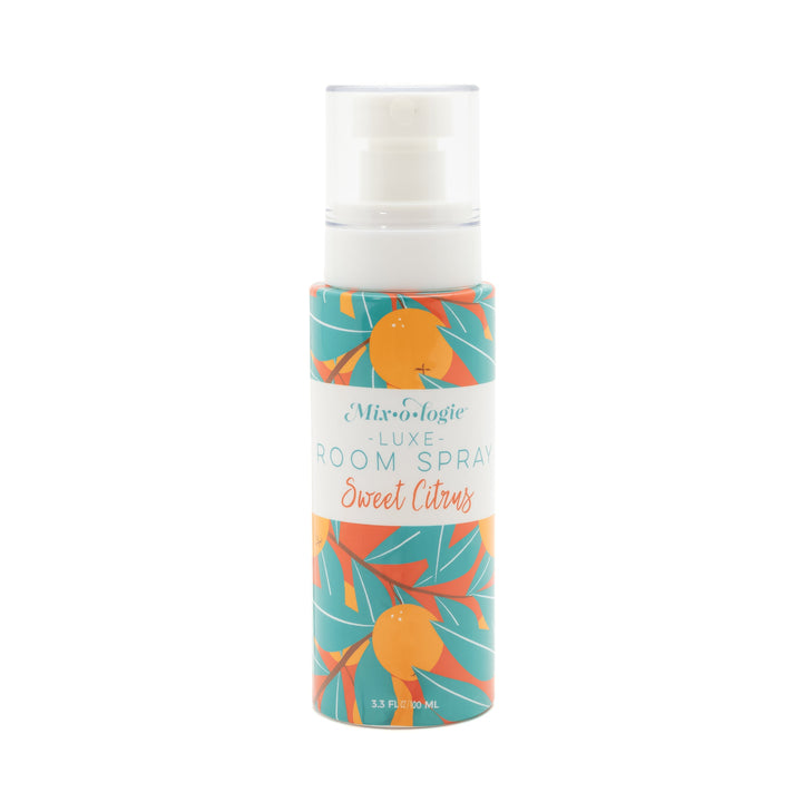 Mixologie Luxe Room Spray in Sweet Citrus, 3.3 fl oz, clear pump bottle with teal and orange citrus fruit illustrated label