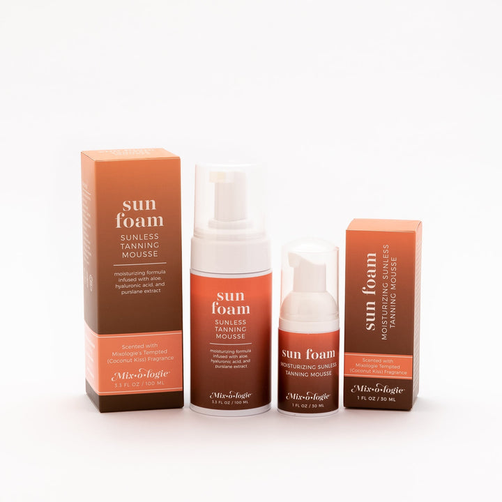 Mixologie Sun Foam Sunless Tanning Mousse full-size 3.3 fl oz and travel 1 fl oz bottles with both boxes displayed together on white background