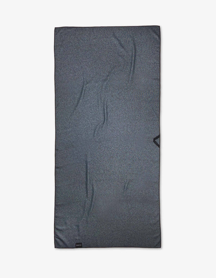 Back side of beach towel in dark gray with subtle textured pattern