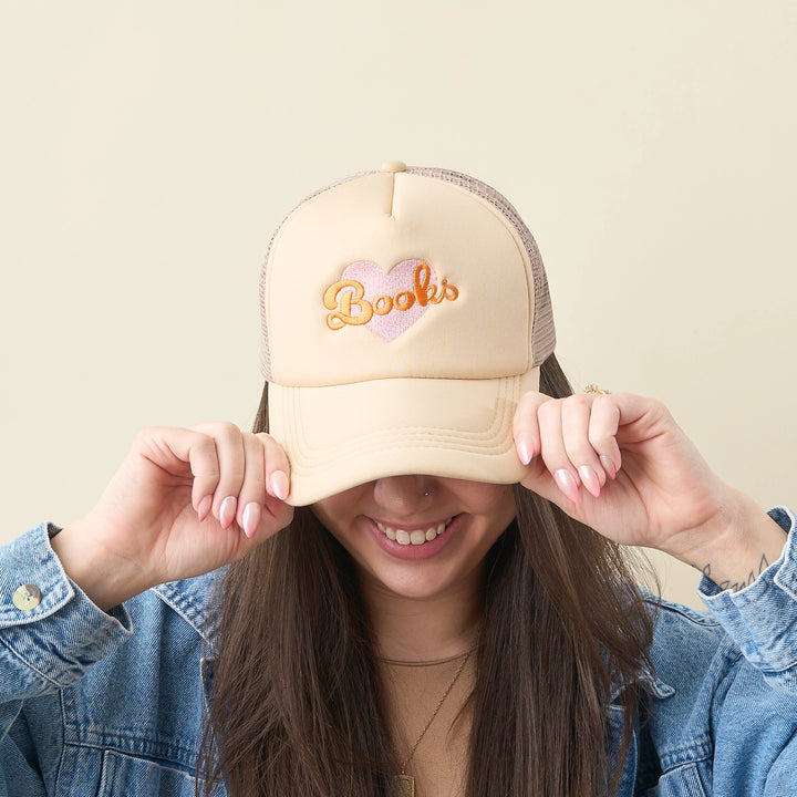 Heart Books Trucker Hat by the Darling Effect