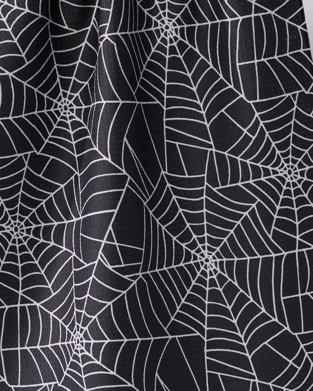 Whisper Web Black Tea Towel by Geometry