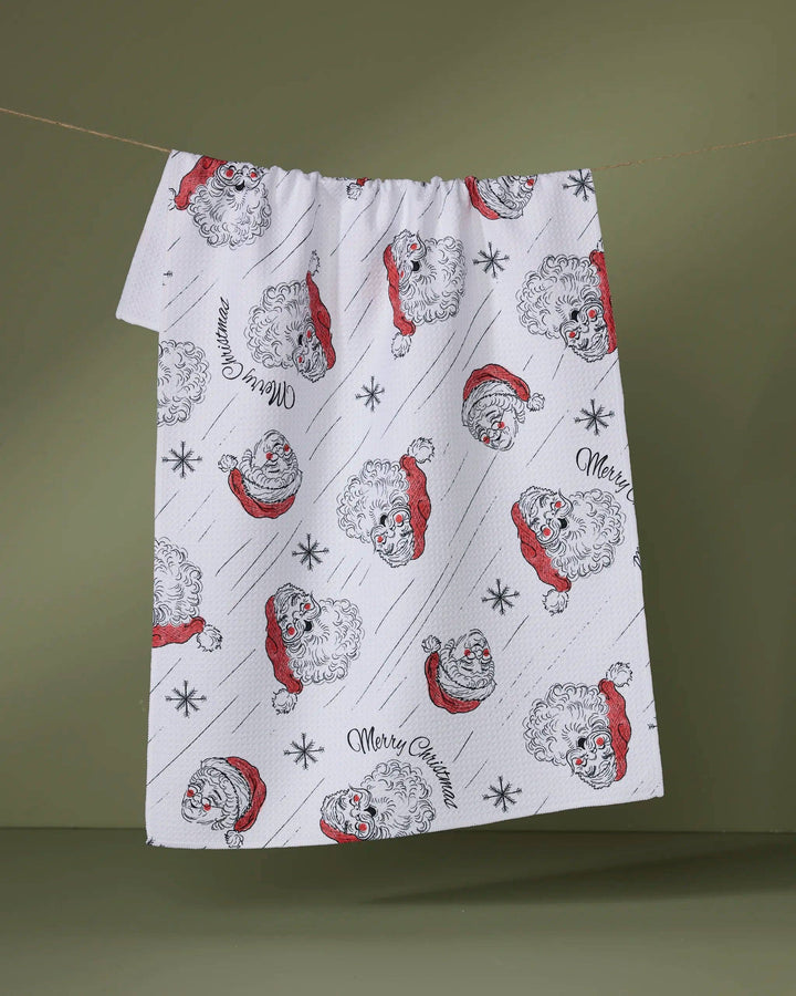 Claus Family Christmas Tea Towel by Geometry