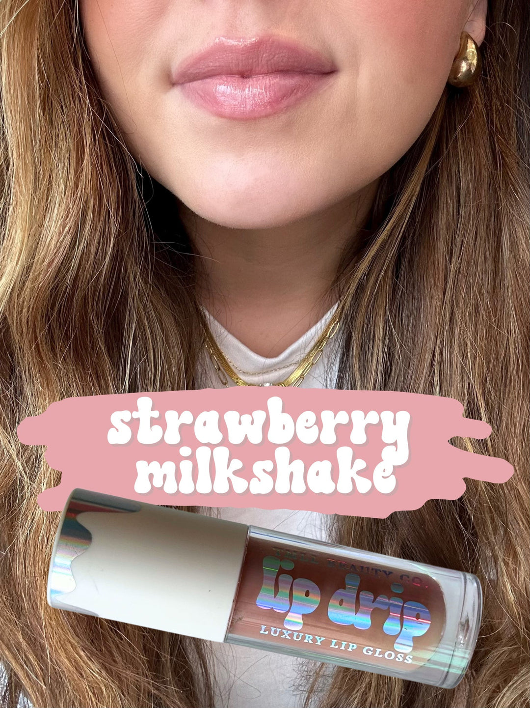 TMLL Beauty Co. Lip Drip Luxury Lip Gloss in Strawberry Milkshake — a soft pink shimmer shade shown on lips with holographic tube below