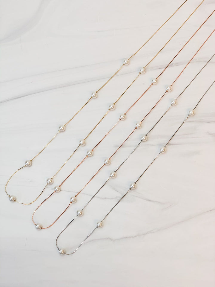Lara Long Pearl Station Necklace